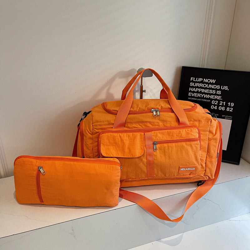A foldable portable shoulder large capacity bag