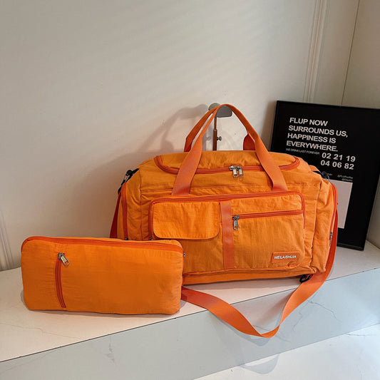 A foldable portable shoulder large capacity bag