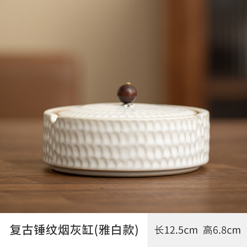 A creative large ceramic ashtray with lid light luxury high sense