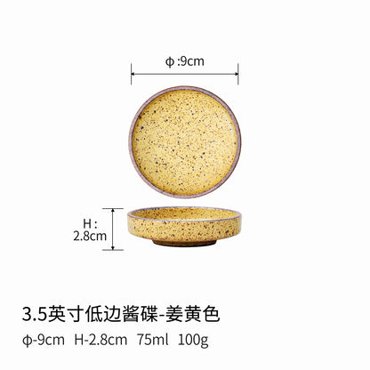 A rough pottery dipping sauce dish