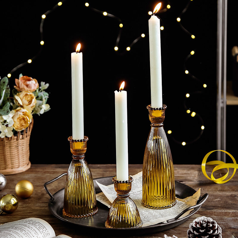 A glass candlestick ornament