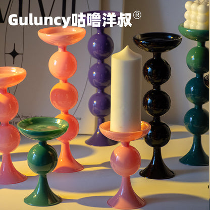 A vintage French Roman column glass candle holder