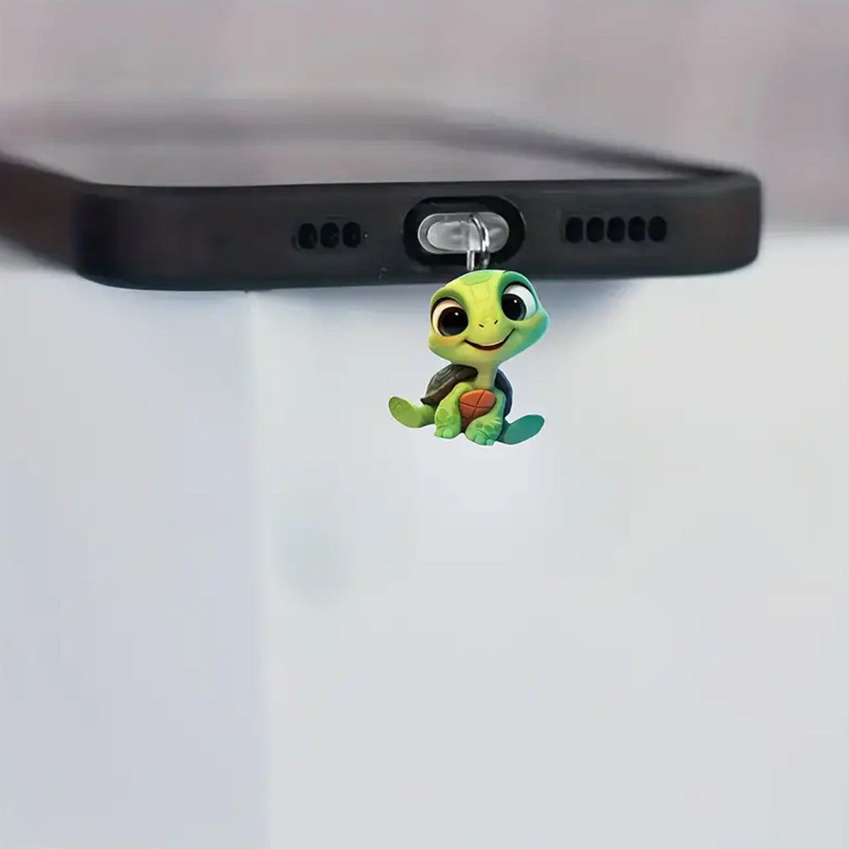 A cartoon cute green turtle acrylic mobile phone dust plug for Apple Lightning interface and Type-c