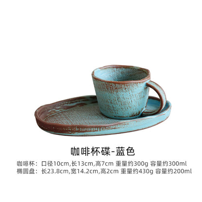A handmade ceramic cup and saucer set