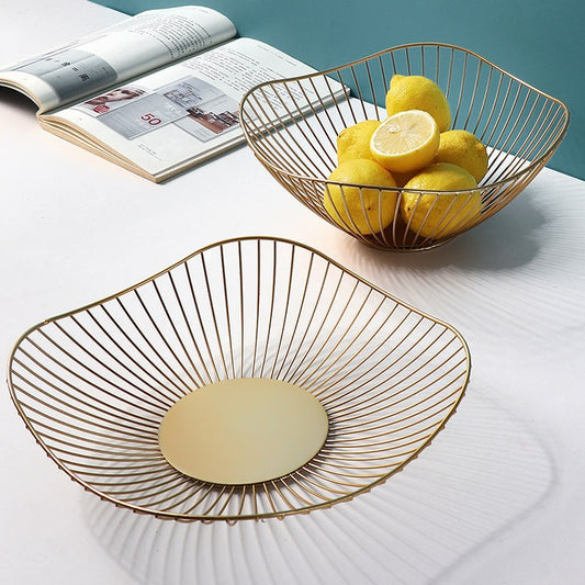 A fruit basket wrought iron storage basket