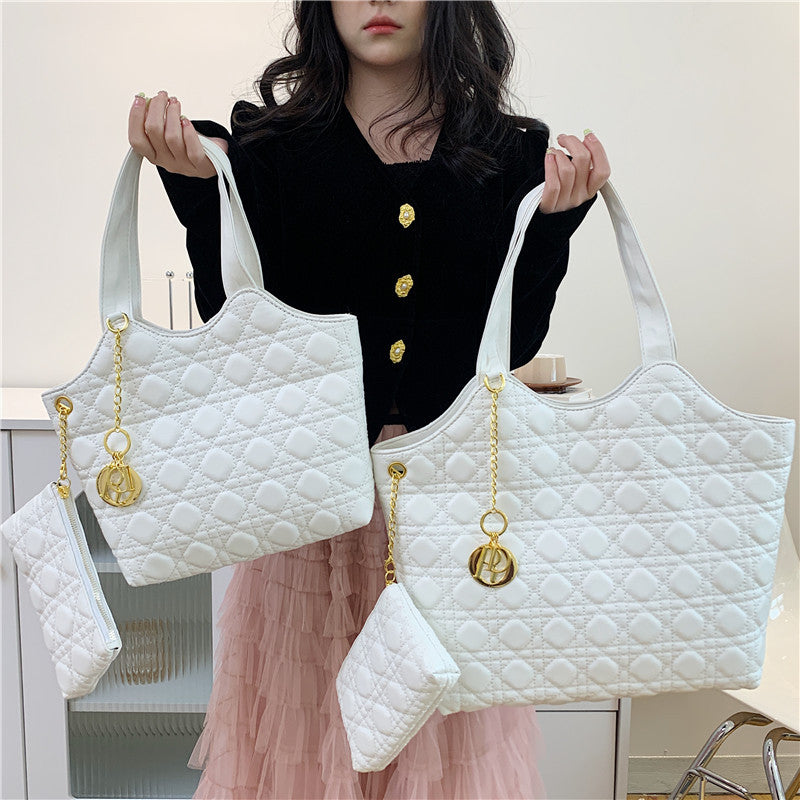 A new spring and summer handbag women's Korean version shoulder tote bag Internet celebrity embroidery thread diamond fashion large capacity Europe and the United States