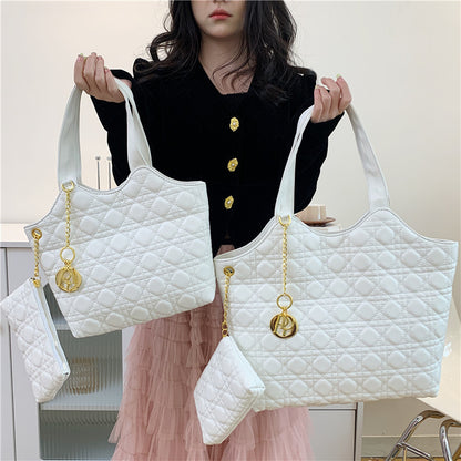 A new spring and summer handbag women's Korean version shoulder tote bag Internet celebrity embroidery thread diamond fashion large capacity Europe and the United States
