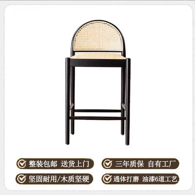 A solid wood rattan chair