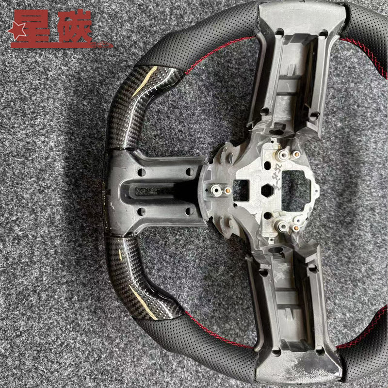 A Suitable for Mustang 10 to 14 style real carbon steering wheel