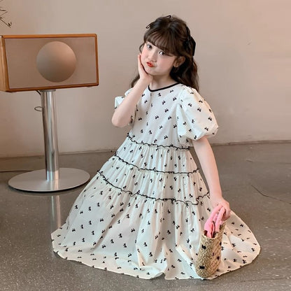 A children's dress summer new Korean version of foreign style princess dress girls middle and older children's bow bubble sleeve skirt tide