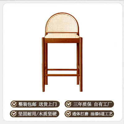 A solid wood rattan chair