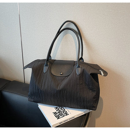 A shoulder bag handbag