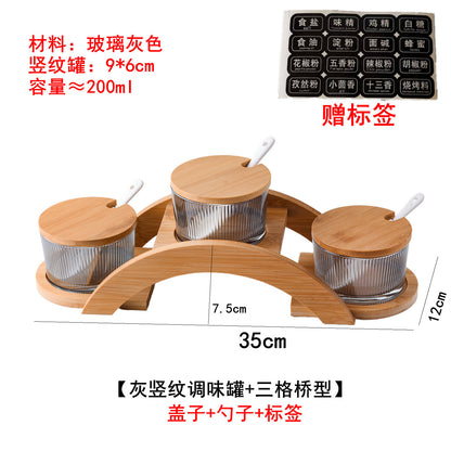 A kitchen seasoning box bamboo cover glass jar