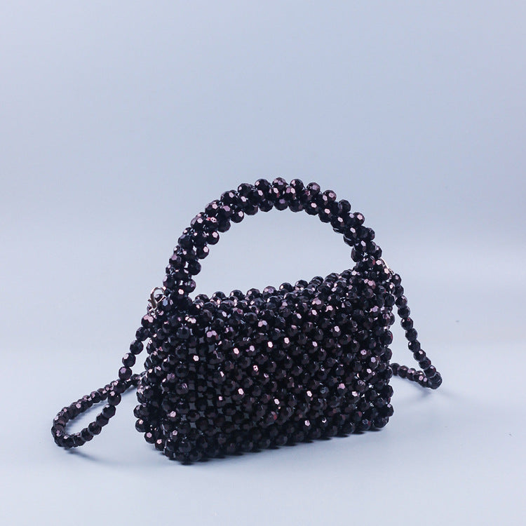 A simple black horn bead acrylic handbag bag handmade beaded woven portable messenger bag