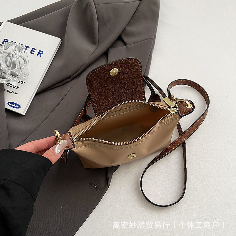 A new Oxford cloth women's bag fashion splicing dumpling bag simple handbag premium texture commuter bag