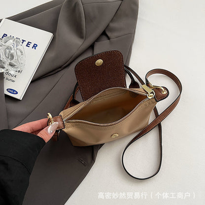 A new Oxford cloth women's bag fashion splicing dumpling bag simple handbag premium texture commuter bag