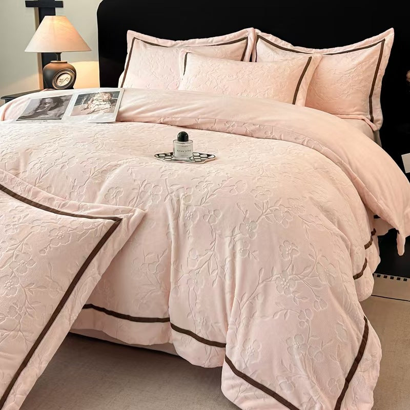 A four-piece set of sheets and quilt covers