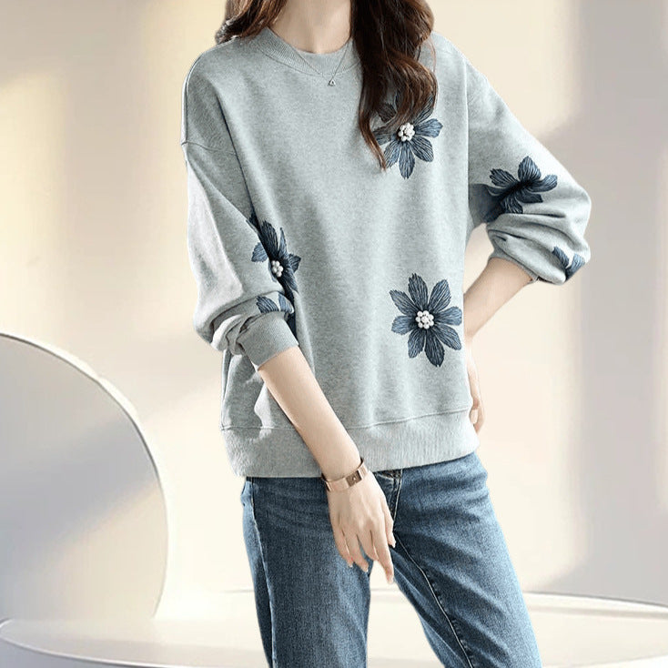 A flower beaded sweater