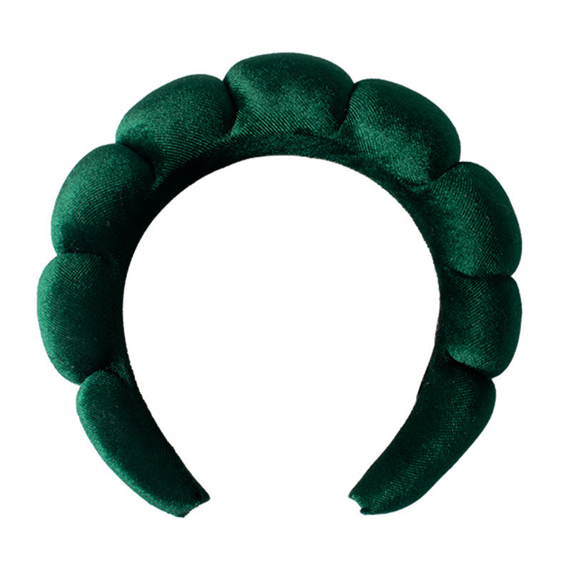 A towel fleece sponge twist headband