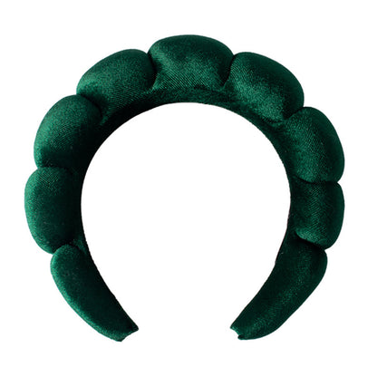 A towel fleece sponge twist headband
