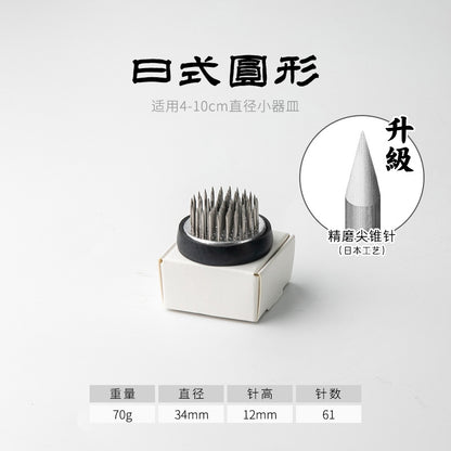 A Stainless Steel Flower Arrangement Base Needle Tool