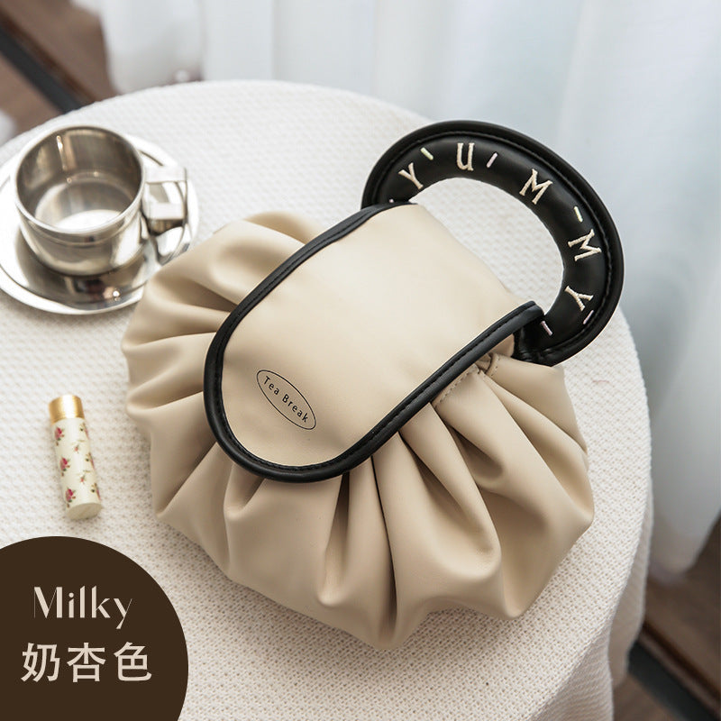 A new lazy drawstring cosmetic bag women's portable waterproof PU travel toilet bag portable storage bag box box