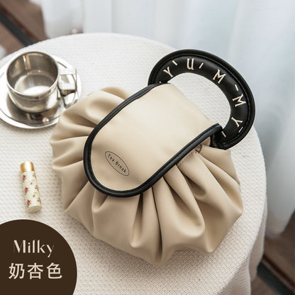 A new lazy drawstring cosmetic bag women's portable waterproof PU travel toilet bag portable storage bag box box