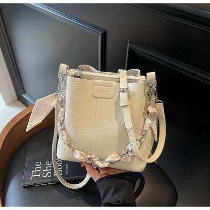 A handbag shoulder messenger bag
