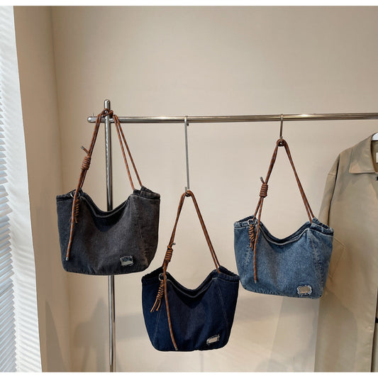 A denim shoulder bag