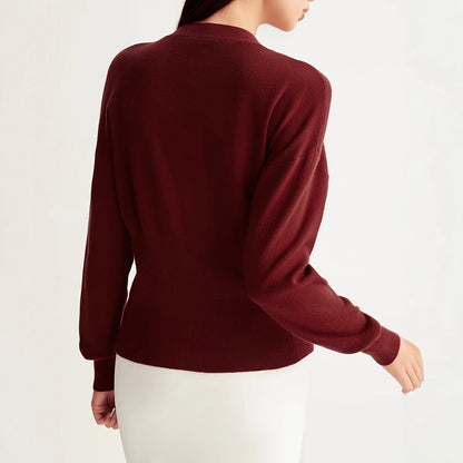 A button-down V-neck knitted sweater