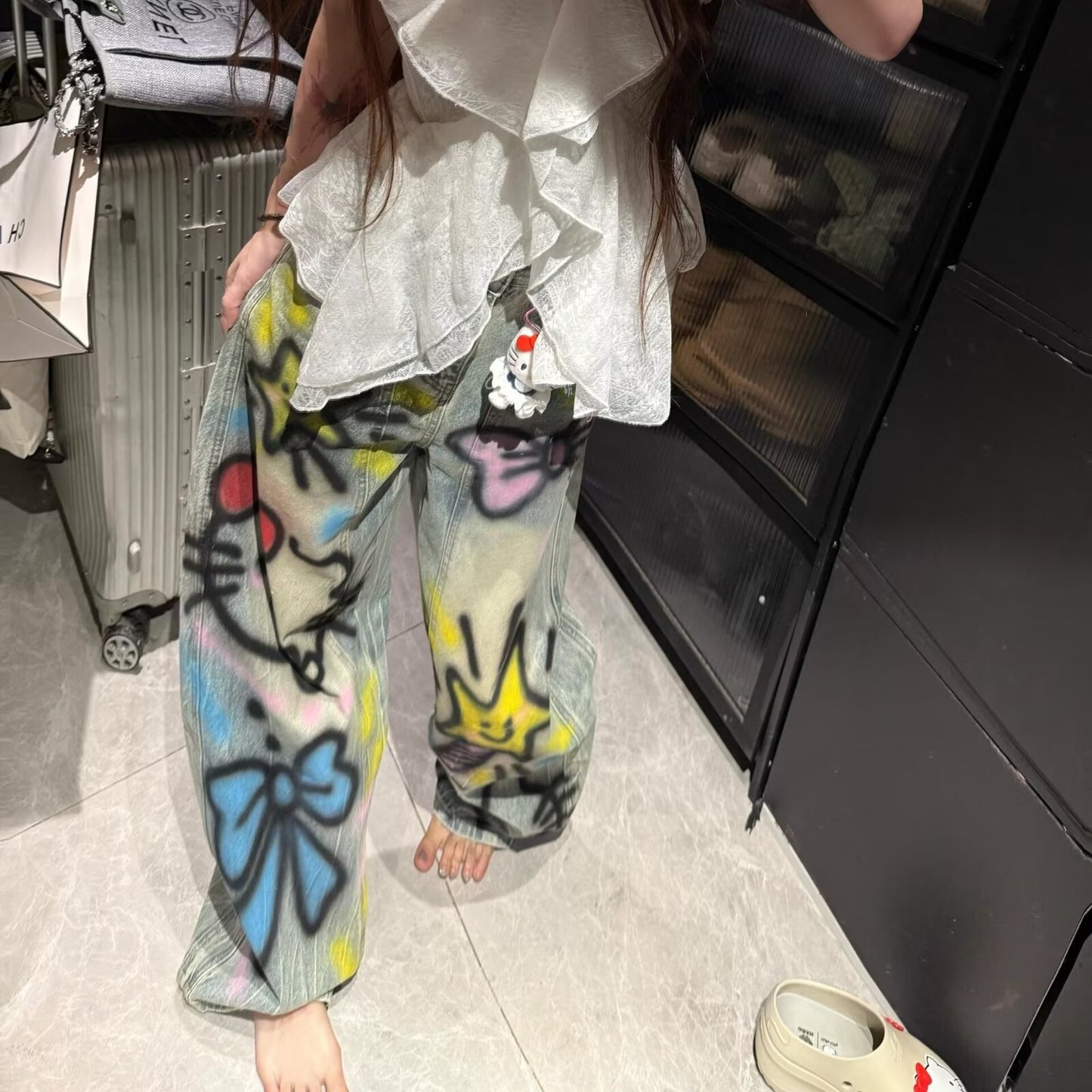 A graffiti print jeans