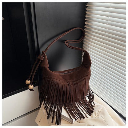 A fringed shoulder bag
