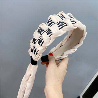 A Korean retro letter plaid headband, four-strand braided personalized hair accessories, wide-brimmed small fragrant headband