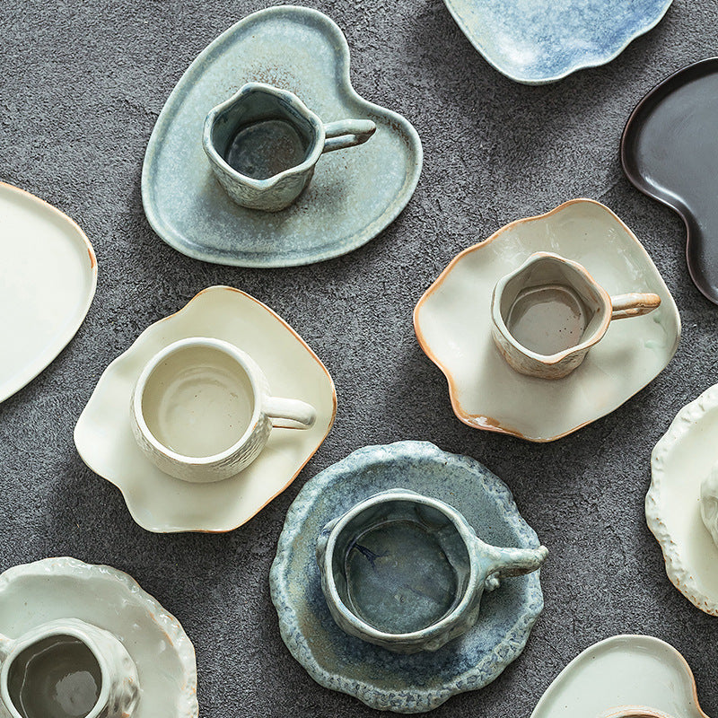 A ceramic coffee cup and saucer set
