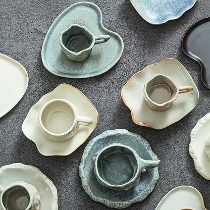 A ceramic coffee cup and saucer set