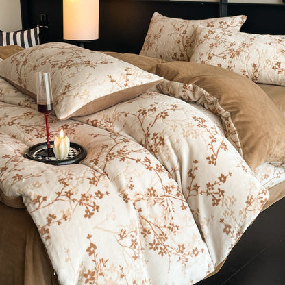 A four-piece quilt cover on the bed