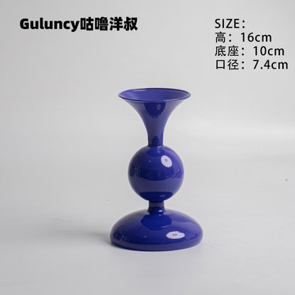 A vintage French Roman column glass candle holder