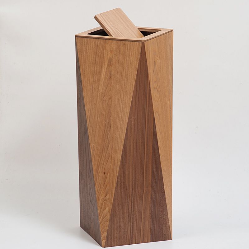 A wooden trash can