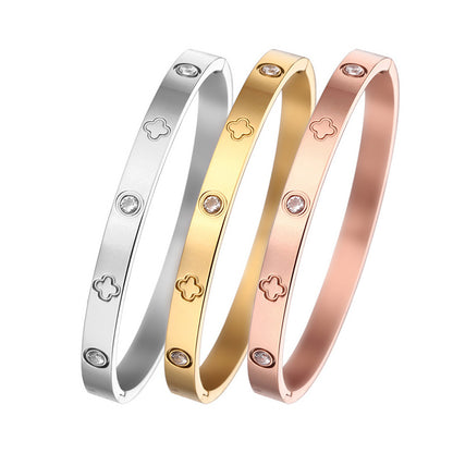 AC European and American cross-border women's electroplated four-leaf clover gold high-end women's jewelry wholesale non-fading jewelry titanium steel bracelet
