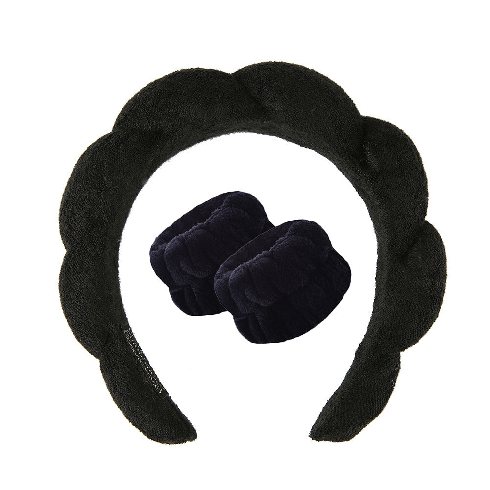 A towel fleece sponge twist headband