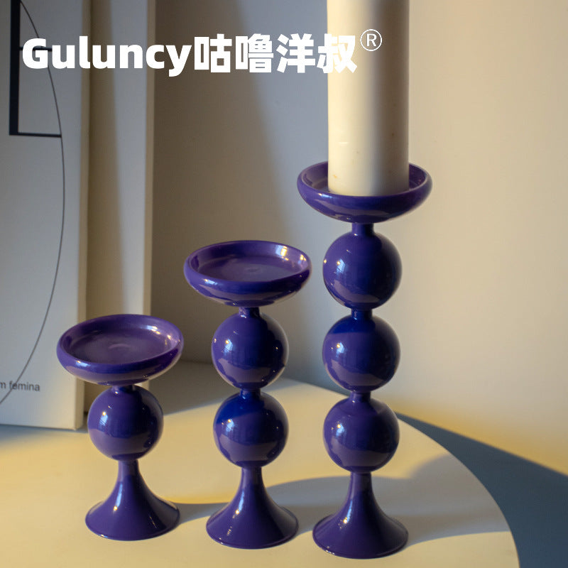 A vintage French Roman column glass candle holder