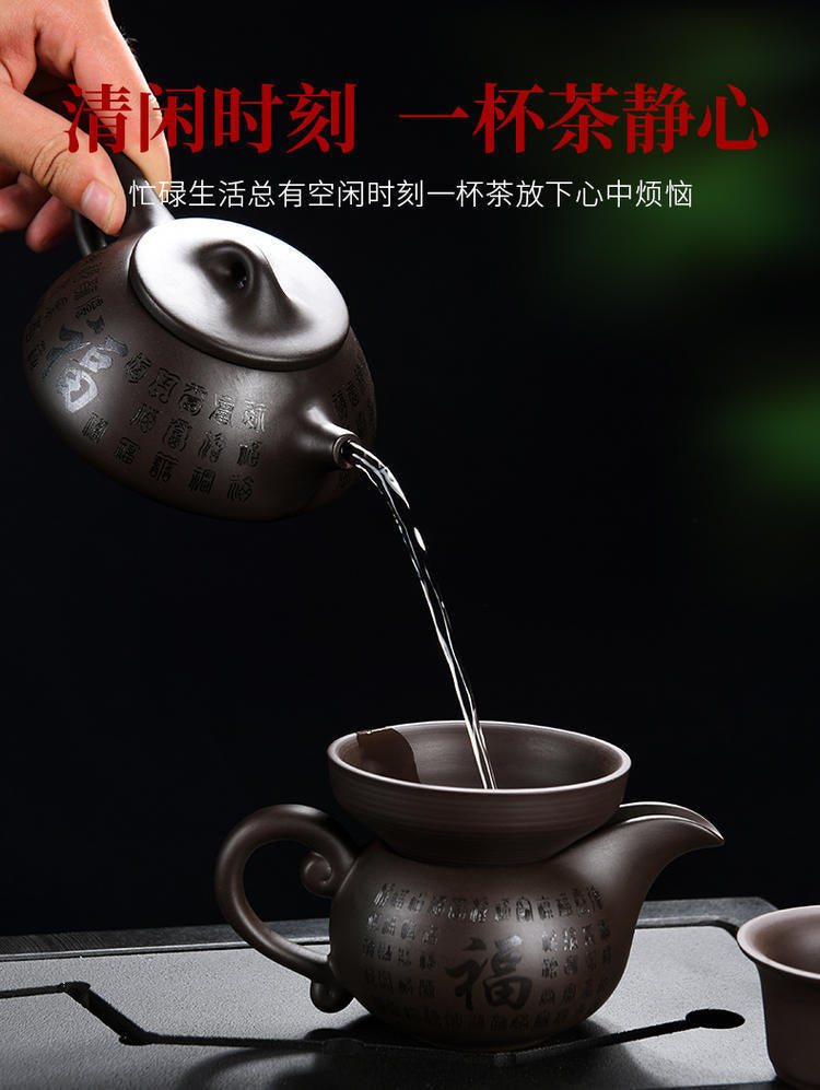 A purple clay pot teapot