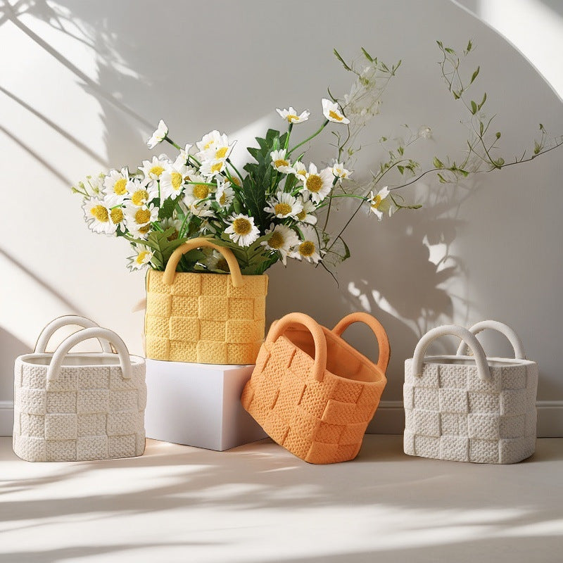 A ceramic handbag vase ornament