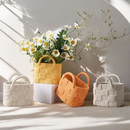 A ceramic handbag vase ornament