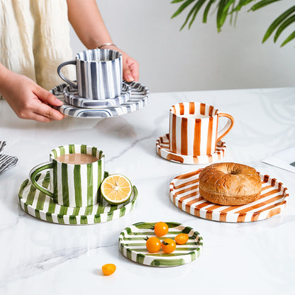 A ceramic coffee cup and saucer set
