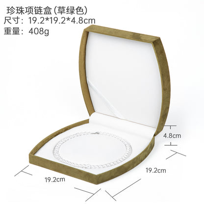 A fine jewelry suede box