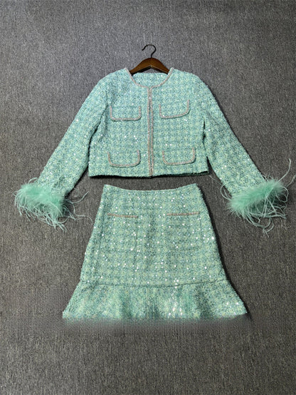 A sequined jacket skirt suit