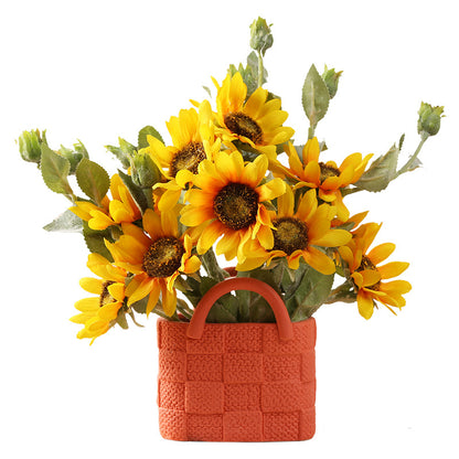 A ceramic handbag vase ornament