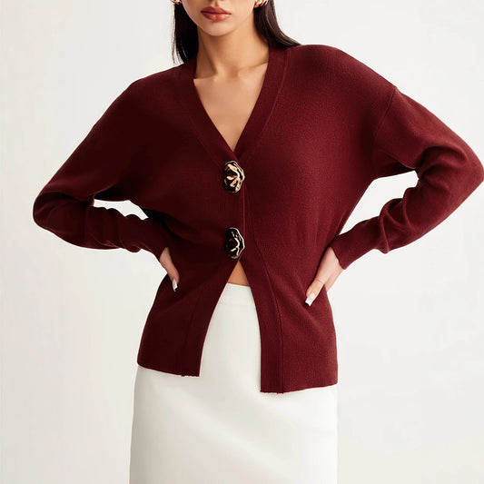 A button-down V-neck knitted sweater