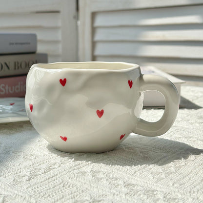 A love irregular ceramic cup and saucer set